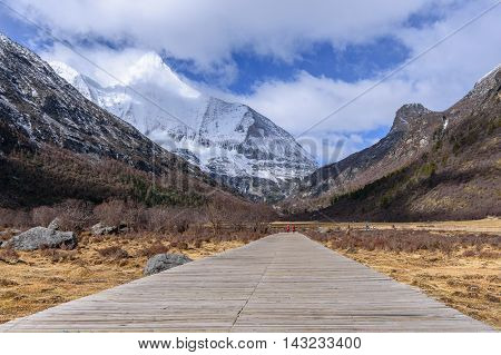 The way to snow mountans at Yading nature reserve, China.