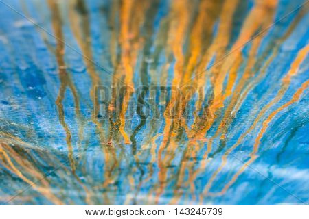 Grunge Background of Old Blue and Orange Painted Metal. Rusty Metal Texture Background. Abstract Iron Bleeding.