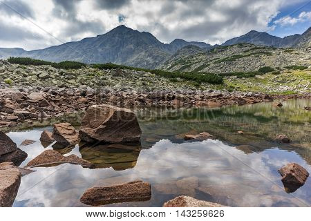 Reflection of Irechek and Musala peak in Musalenski lakes,  Rila mountain, Bulgaria
