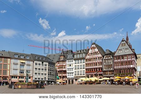 FRANKFURT AM MAIN GERMANY - AUGUST 7 2015: Romerberg square (Roman Mountain) the historic heart of the city and the centre of the old town.