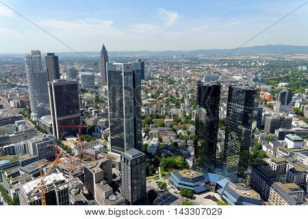 FRANKFURT AM MAIN GERMANY - AUGUST 6 2015: Aerial view of the central business district from the observatory deck of the Mian tower. Frankfurt is the largest financial centre in continental Europe.