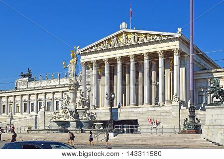 VIENNA, AUSTRIA - SEPTEMBER 01, 2015: austrian parliament building and Pallas Athena fountain in front, Vienna on september 02, 2015