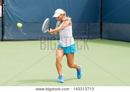 Mason Ohio - August 16 2016: Yulia Putintseva in a match at the Western and Southern Open in Mason Ohio on August 16 2016.