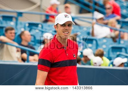 Mason Ohio - August 15 2016: Sam Querrey in a first round match at the Western and Southern Open in Mason Ohio on August 15 2016.