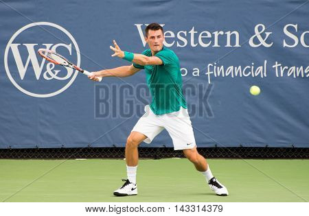 Mason Ohio - August 16 2016: Bernard Tomic in a match at the Western and Southern Open in Mason Ohio on August 16 2016.