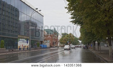 Rostov-on-Don Russia -August 142016: On Bolshaya Sadovaya after the rain moving cars and citizens