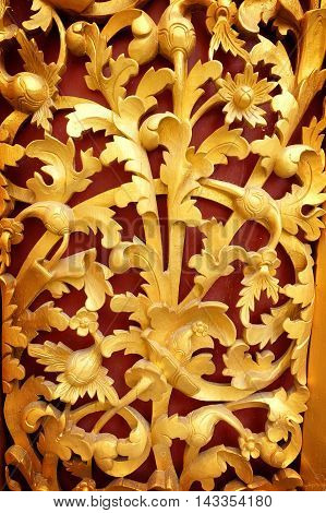 the beautiful gold of pattern Lai Kanok (Thai design) in wood