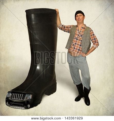 A man advertises good rubber boots for sale.