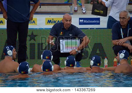 Budapest, Hungary - Jul 17, 2014. Romania's STANOJEVIC Dejan head coach talking about the tactics. The Waterpolo European Championship was held in Alfred Hajos Swimming Centre in 2014.
