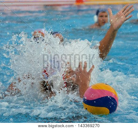 Budapest, Hungary - Jul 17, 2014. Ball, hands and a splash of water. The Waterpolo European Championship was held in Alfred Hajos Swimming Centre in 2014.