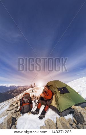 Camping on the top of the mountain in winter.