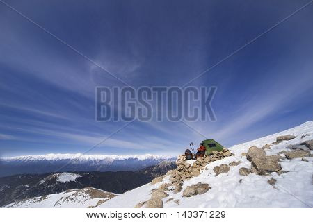 Camping on the top of the mountain in winter.