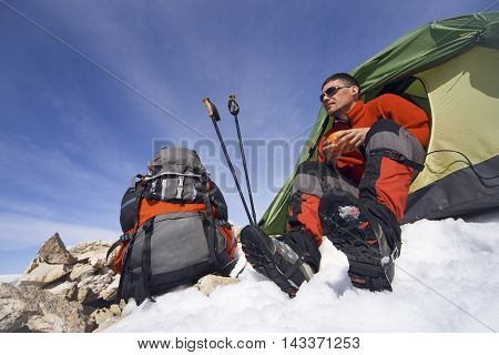 Camping on the top of the mountain in winter.