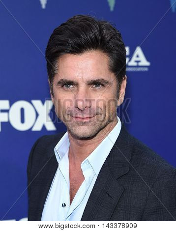 LOS ANGELES - AUG 08:  John Stamos arrives to the FOX Summer TCA Party 2016 on August 08, 2016 in West Hollywood, CA                