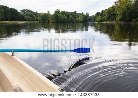 Boat Trip On The Boat With The Oars In City Pond