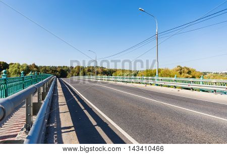 Empty road on the bridge in rural place.