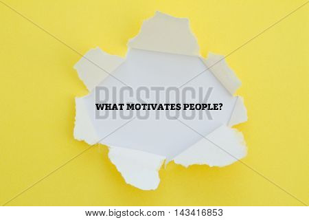 WHAT MOTIVATES PEOPLE? question written under torn paper.