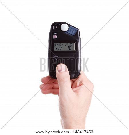 Flash Meter In Hand On White Background