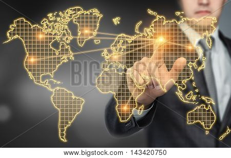 Businessman touching the digital touchscreen with world map with his finger. Innovative technology. Business presentation. Succesful management. Global communication. International business.
