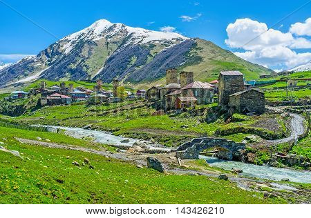 The medieval houses and towers of Ushguli on the bank of Enguri river in the same named gorge in Svaneti Georgia.