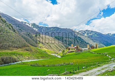 The Chajashi village located among the green meadows in Enguri gorge Ushguli Georgia.