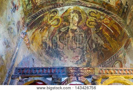 USHGULI GEORGIA - MAY 22 2016: The apse of Lamaria Church is covered with old fresco depicting Jesus Christ and the Saints on May 22 in Ushguli.