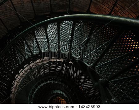 dark metal staircase in Currituck Beach Lighthouse and Museum