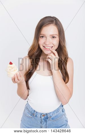Girl In Jeans Thinking About Cupcake