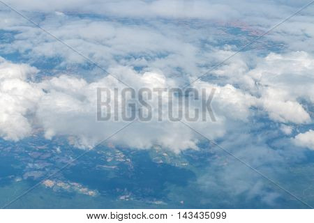 Clouds in the skyView from window plane .