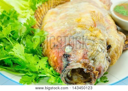 grilled fish Mixed with salt and vetgetable, thai food