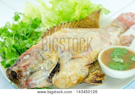 grilled fish Mixed with salt and vetgetable, thai food