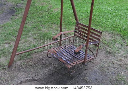 Swing on amusement park. kid toy in garden