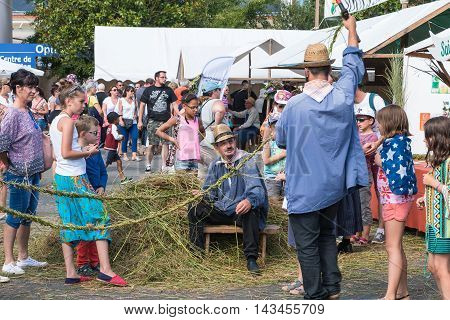 Men Manufacturing Rope In The Old-fashioned Way