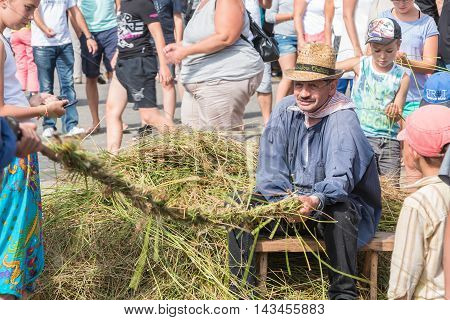 Men Manufacturing Rope In The Old-fashioned Way