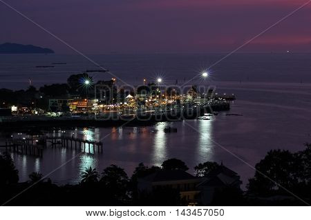 reflection of light and seascape at night