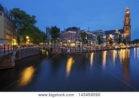 Famous view of Amsterdam Canal by night. Netherlands