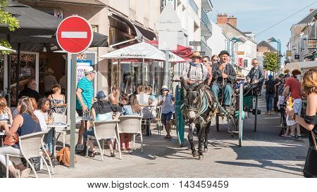 Antique Cart Pulled By A Donkey In The Streets Of The City