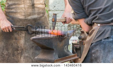 Demonstration By Two Blacksmiths Labor Metal To The Old Way