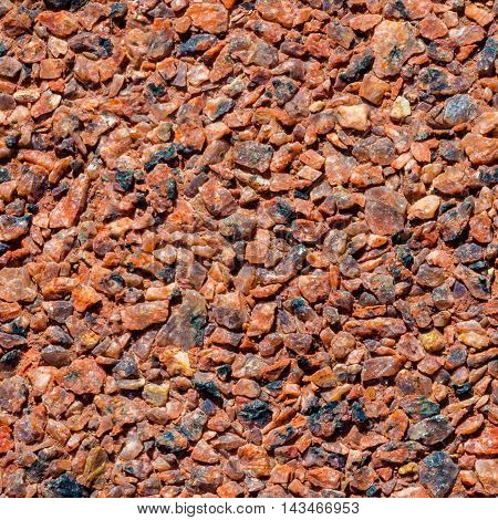 Background from small stones. Granite stone floor or wall background texture. Lessovsky. Lessovsky.