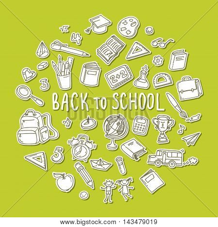 Concept of education. Back to school. Freehand drawing school items on green background.