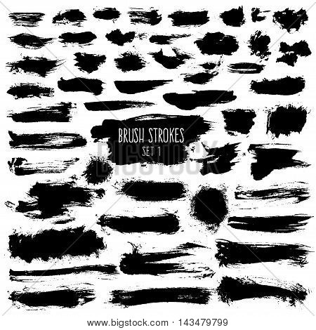 Brush stroke set. Black hatches of different shapes on white background. Isolated hand-drawn elements.