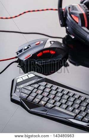 Gaming Keyboard And Mouse On Shiny Surface