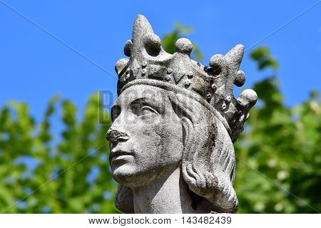 Poissy France - august 6 2016 : the statue of the king Saint Louis near the collegiate church