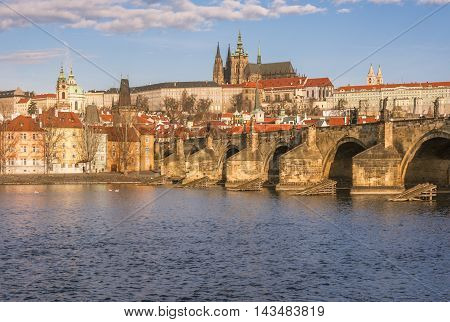 Charles Bridge over the river Vltava in Prague - Cityscape with a section of the Charles Bridge and the river Vltava, which crosses Prague, Czech Republic.