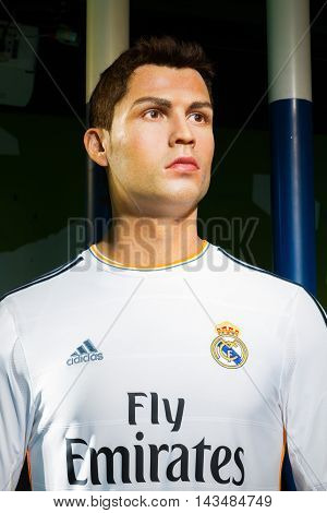 BANGKOK THAILAND - DECEMBER 19: A waxwork of Cristiano Ronaldo on display at Madame Tussauds on December 19 2015 in Bangkok Thailand.