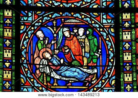 Poissy France - august 6 2016 : stained glass window of the historical collegiate church where the king Saint Louis was baptised