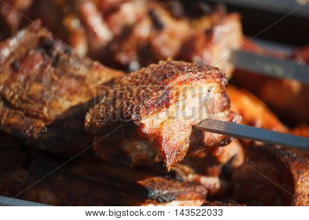 Closeup Of Some Meat Skewers Being Grilled In A Barbecue
