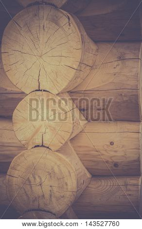 Corner joint on a log cabin - Rustic image with details of a wooden cabin corner, with logs joined together with a great construction technique.