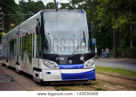 RIGA, LATVIA - AUGUST 2016: Front view on Skoda 15 T ForCity Tram staying at tram staition of Riga town