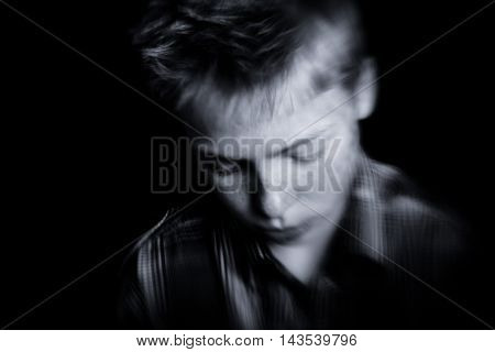 Sad Boy Looking Down